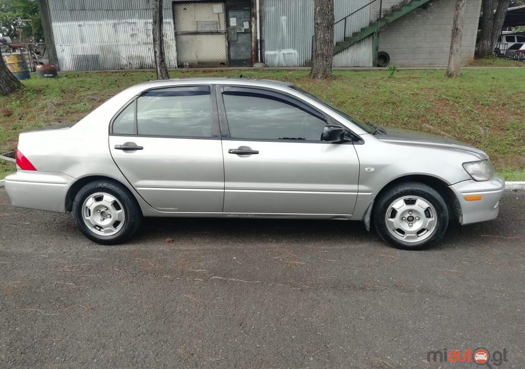 Mitsubishi lancer 2003 года